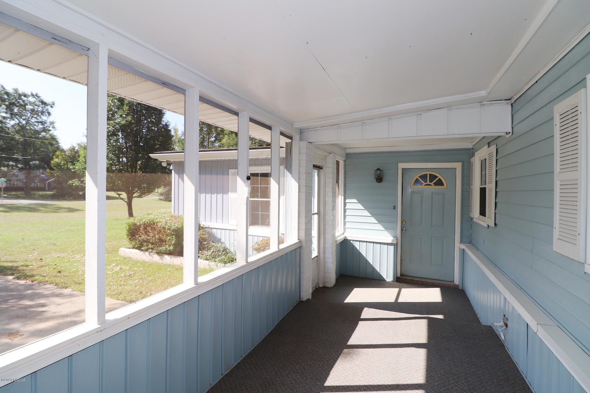 6669 Goodall Mill Road Macon, GA 31216 - Photo 4 of 28 a view of a large window with an outdoor view