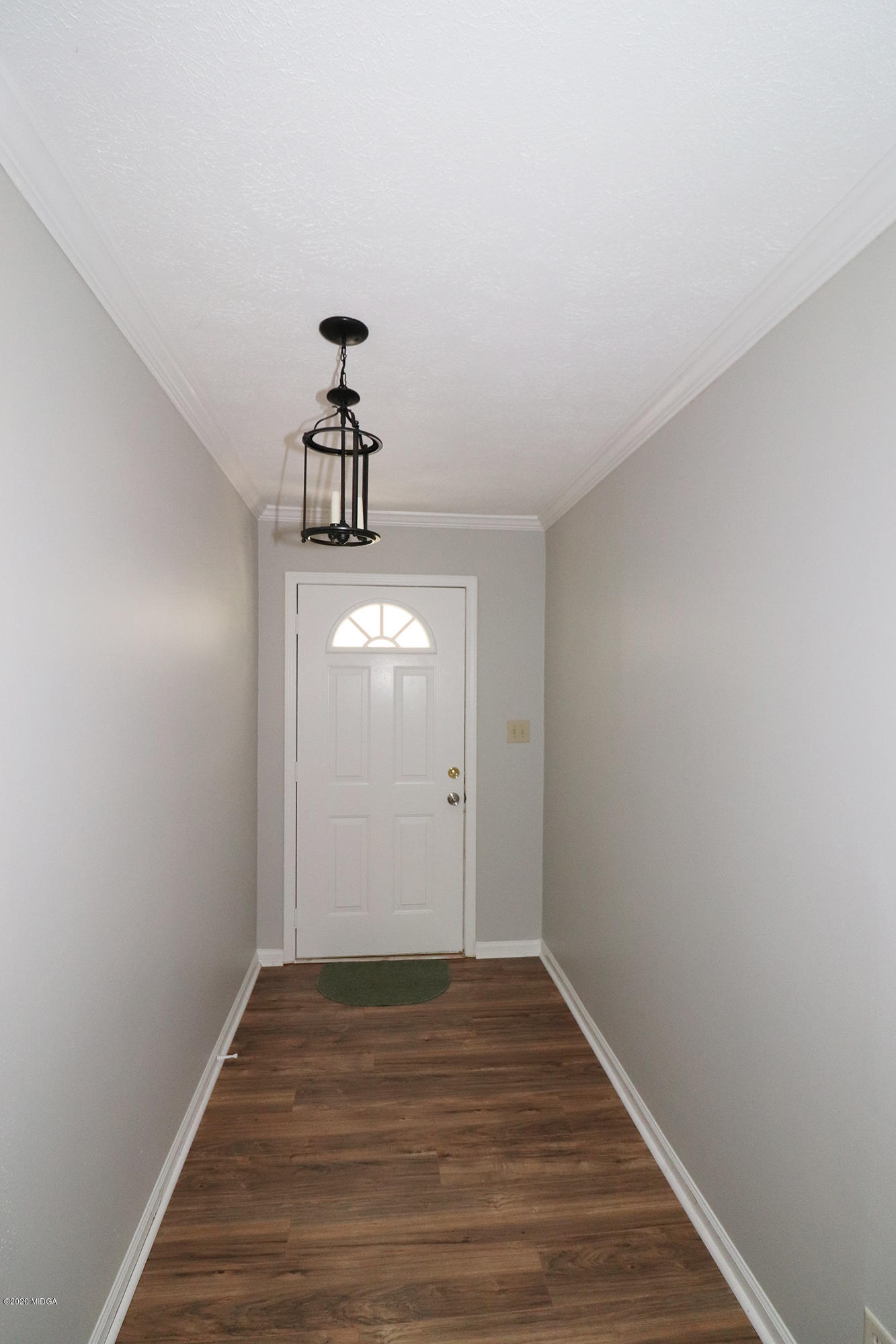 6669 Goodall Mill Road Macon, GA 31216 - Photo 6 of 28 a view of empty room with wooden floor