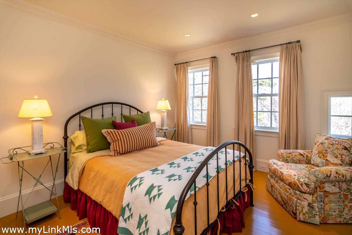 25 Lelands Path Edgartown, MA 02539 - Photo 52 of 56 a bedroom with a bed and window