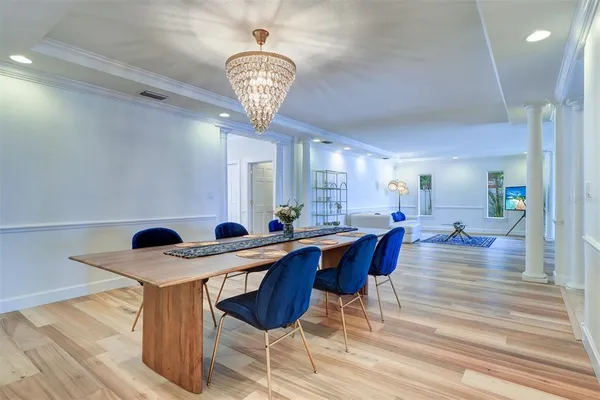 a view of a dining room with furniture