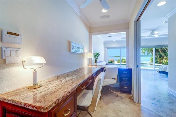 a dining hall with granite countertop a granite counter top and painted walls