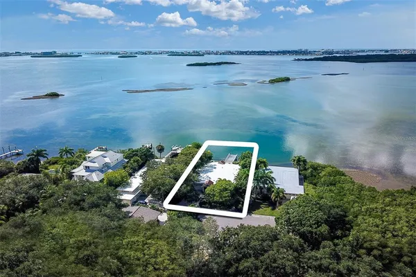 a view of a lake with a building in the background