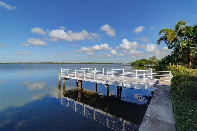 a view of a balcony with chairs
