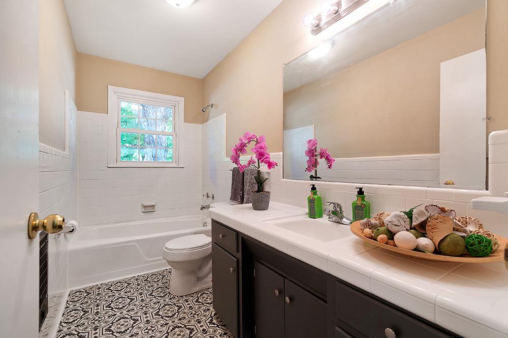 210 Pitt Lane Springfield, TN 37172 - Photo 16 of 27 a bathroom with a sink a toilet and shower