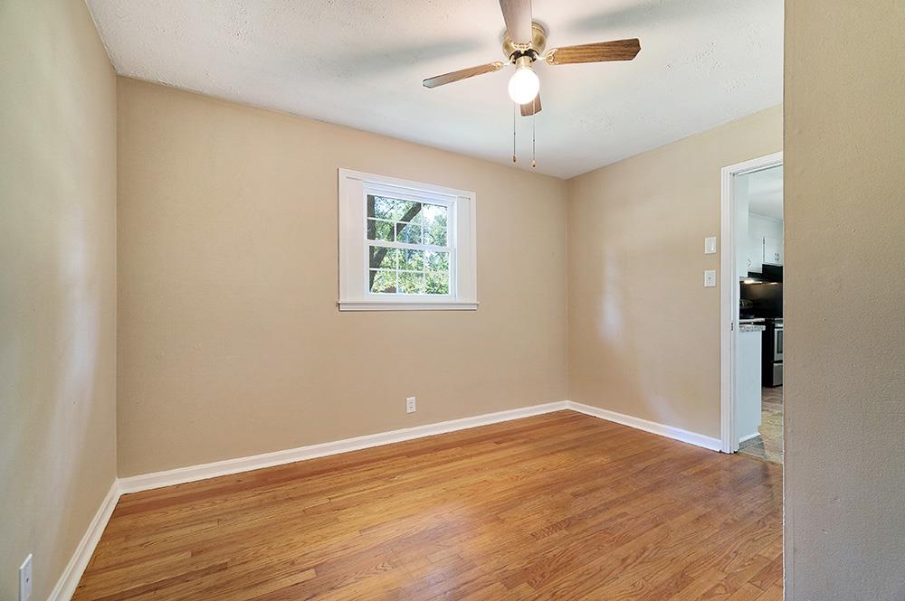 210 Pitt Lane Springfield, TN 37172 - Photo 20 of 27 wooden floor in an empty room with a window