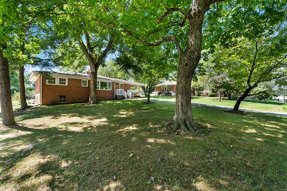 210 Pitt Lane Springfield, TN 37172 - Photo 3 of 27 a view of a house with a backyard