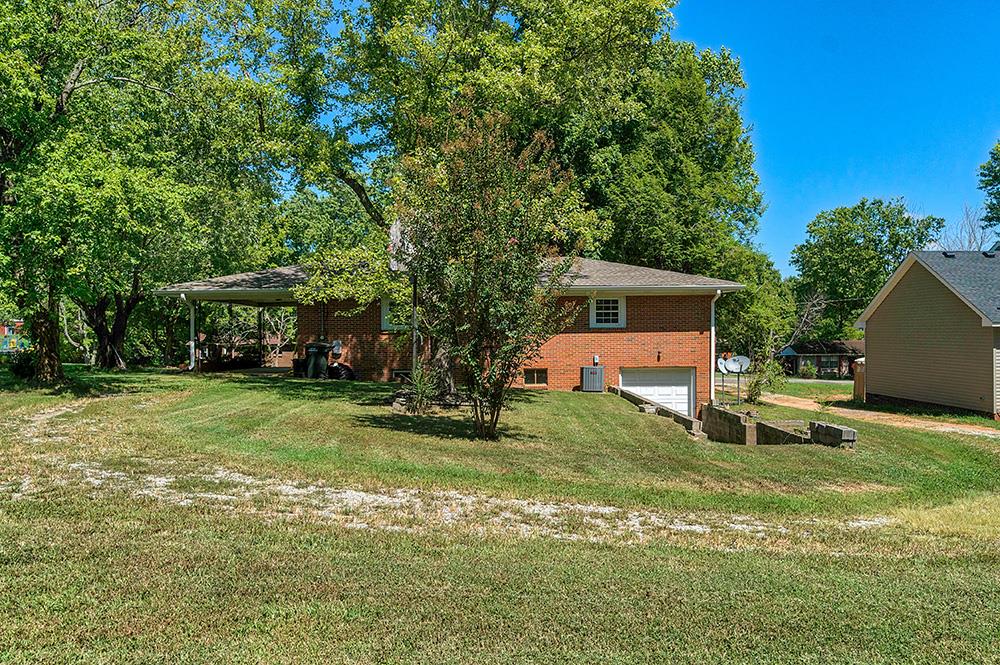 210 Pitt Lane Springfield, TN 37172 - Photo 26 of 27 a house with trees in the background