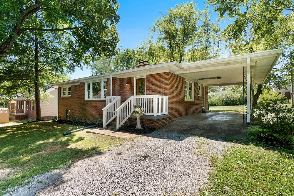210 Pitt Lane Springfield, TN 37172 - Photo 5 of 27 a view of a house with a yard and large tree