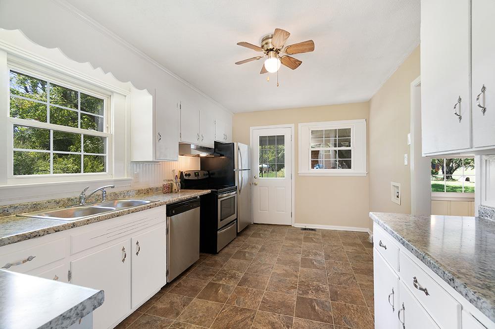 210 Pitt Lane Springfield, TN 37172 - Photo 10 of 27 a kitchen with a sink appliances and cabinets