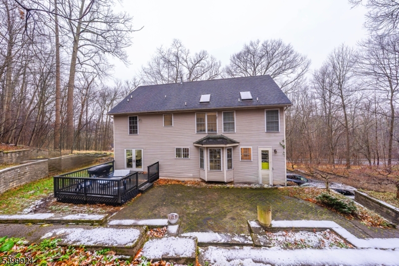 123 Vail Road Columbia, NJ 07832 - Photo 14 of 44 a front view of a house with swimming pool and trees around