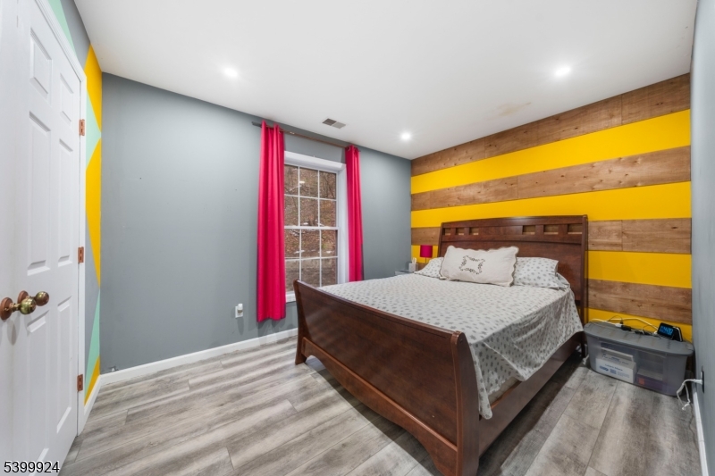 123 Vail Road Columbia, NJ 07832 - Photo 21 of 44 a bedroom with a bed and a view of walk in closet