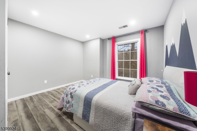 123 Vail Road Columbia, NJ 07832 - Photo 23 of 44 a bedroom with a bed and a window