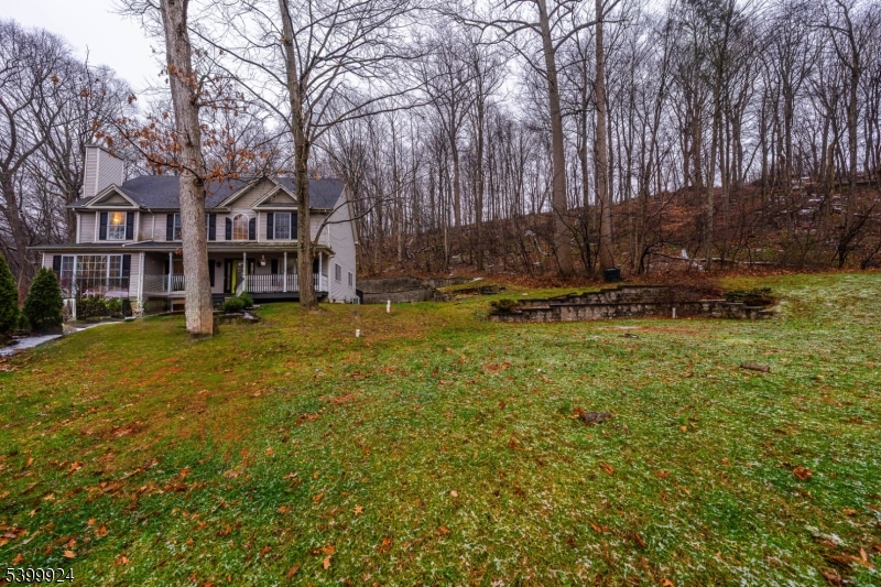 123 Vail Road Columbia, NJ 07832 - Photo 34 of 44 a view of a yard with plants and large trees
