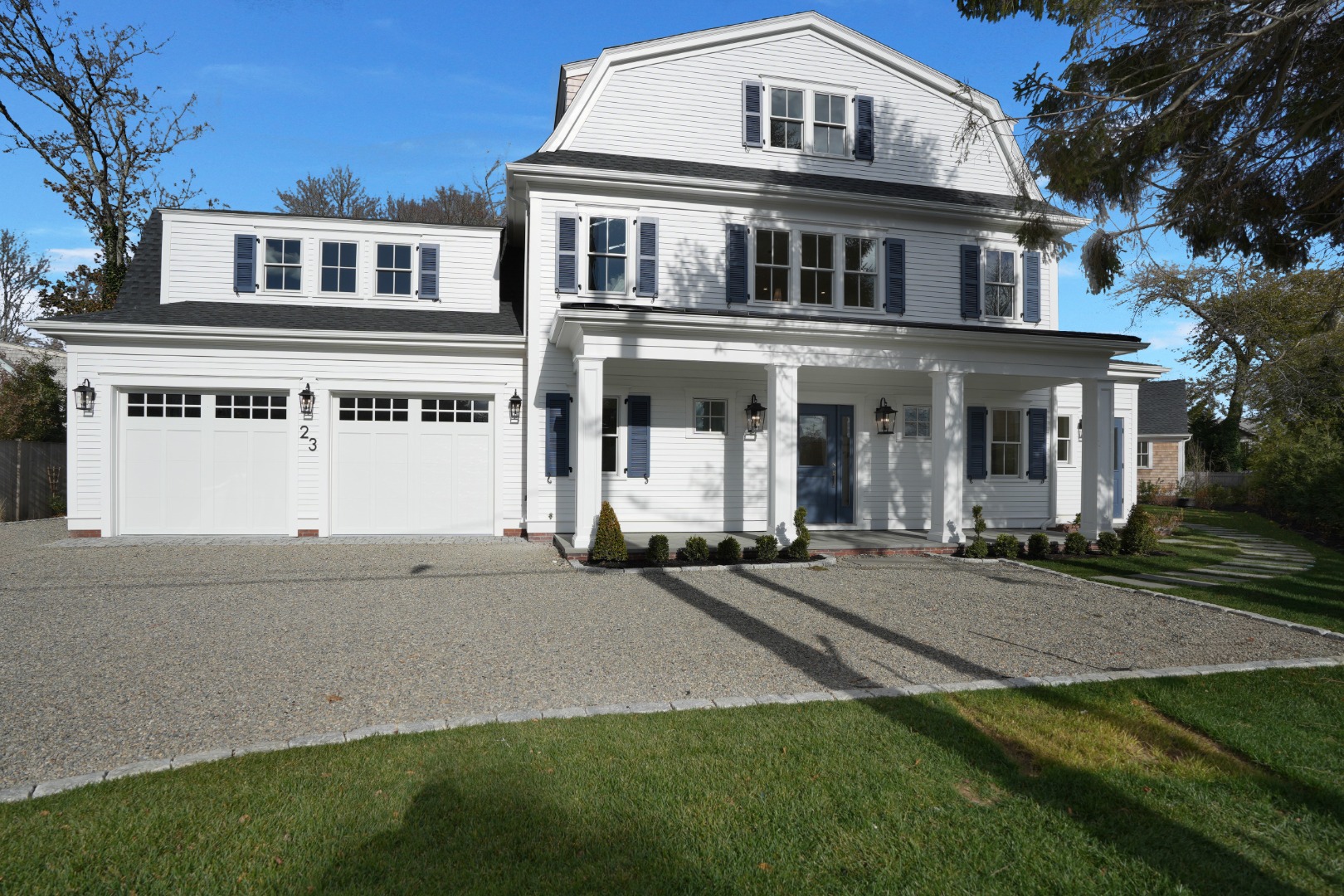 23 Pinehurst Road Edgartown, MA 02539 - Photo 2 of 57 a front view of a house with a yard