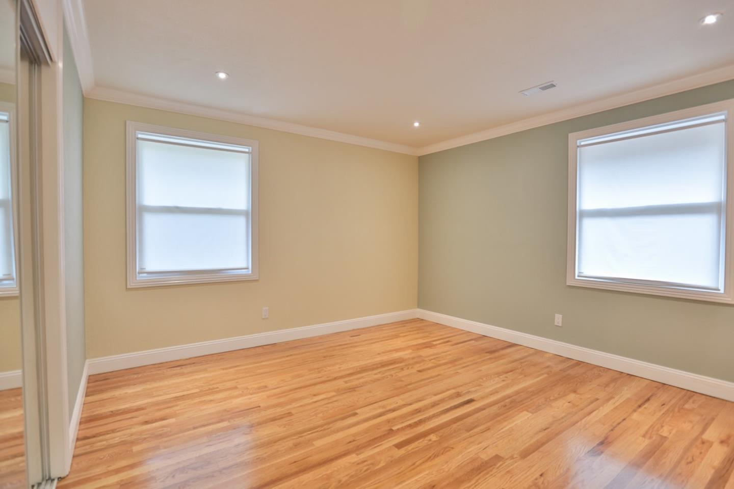 1663 Cross Way San Jose, CA 95125 - Photo 13 of 25 a view of empty room with wooden floor and fan