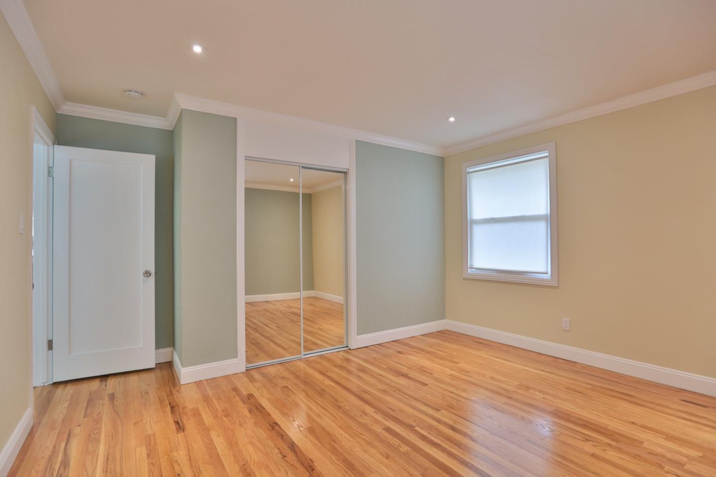 1663 Cross Way San Jose, CA 95125 - Photo 14 of 25 a view of empty room with wooden floor and fan