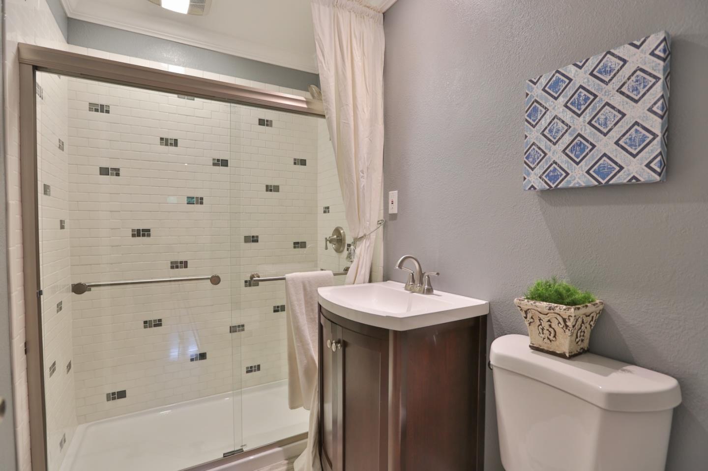 1663 Cross Way San Jose, CA 95125 - Photo 17 of 25 a bathroom with a sink a toilet and shower