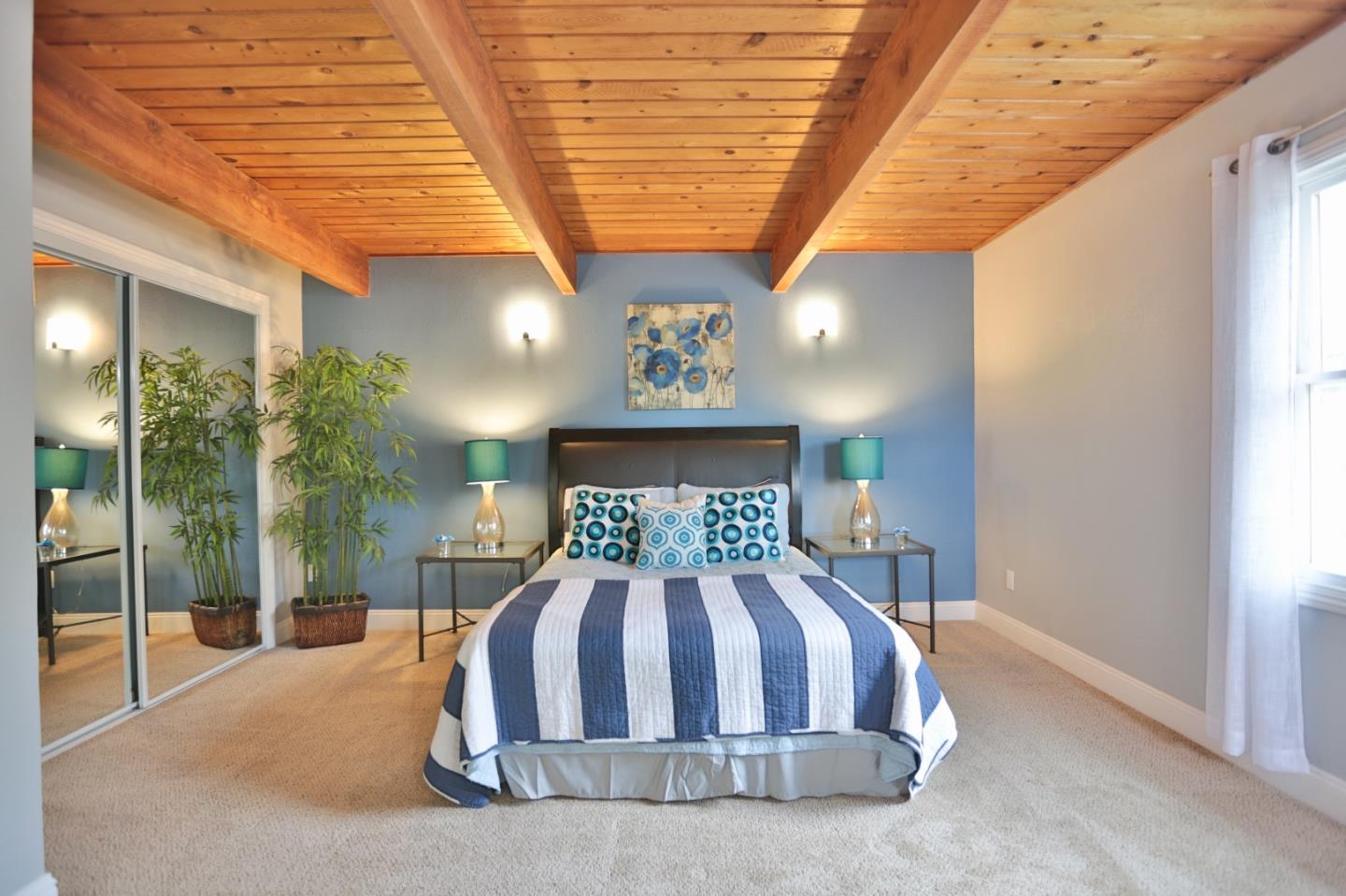 1663 Cross Way San Jose, CA 95125 - Photo 19 of 25 a bed sitting in a spacious bedroom next to a larger window