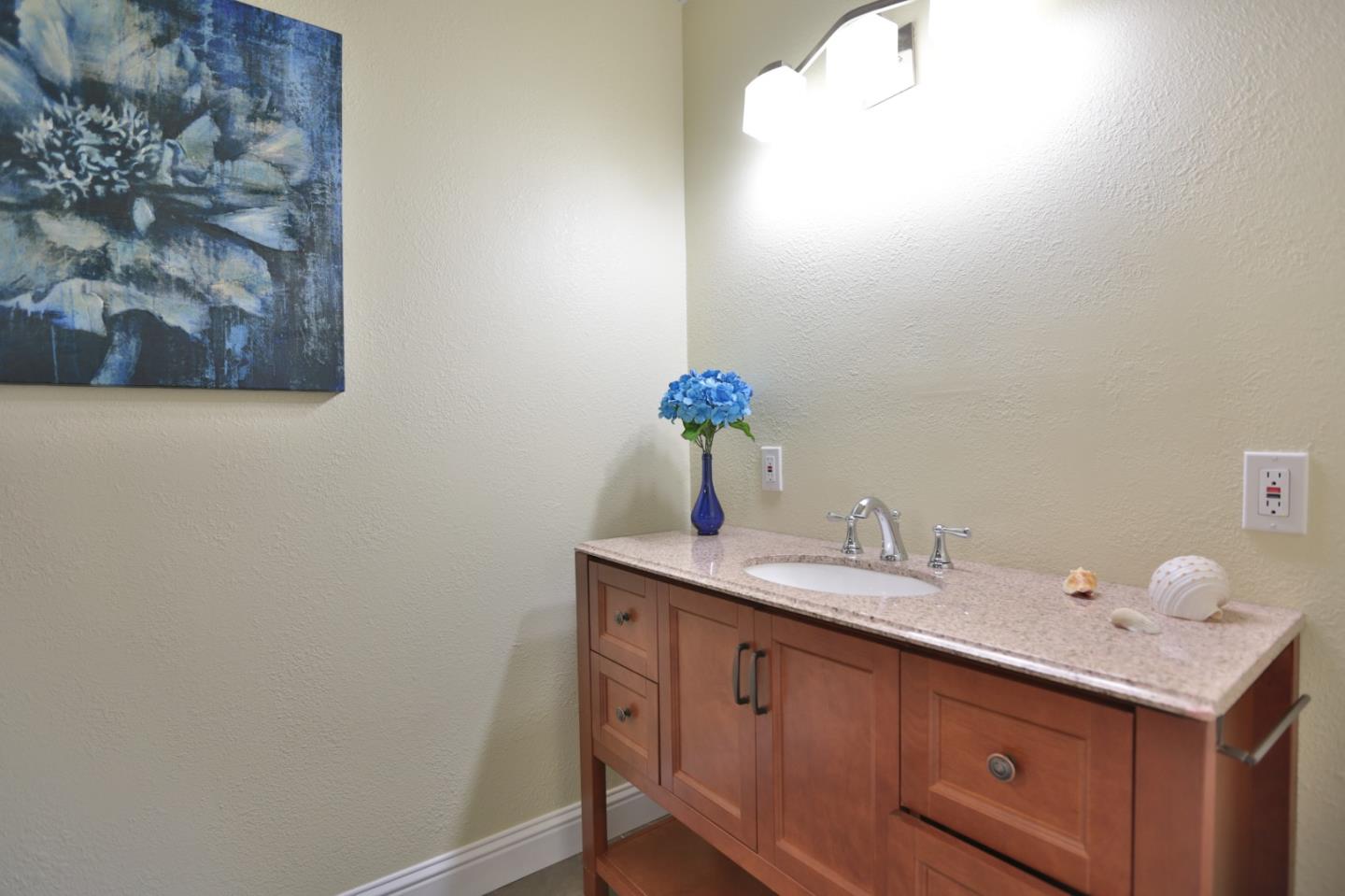 1663 Cross Way San Jose, CA 95125 - Photo 21 of 25 a bathroom with a sink and a mirror