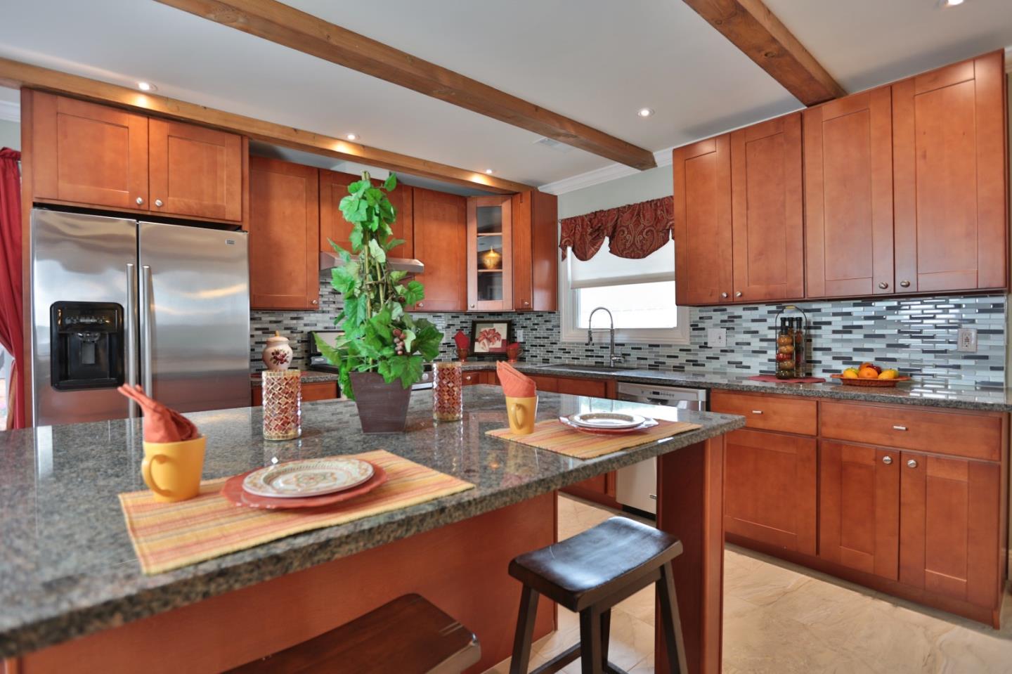 1663 Cross Way San Jose, CA 95125 - Photo 4 of 25 a kitchen with stainless steel appliances granite countertop a sink refrigerator and cabinets