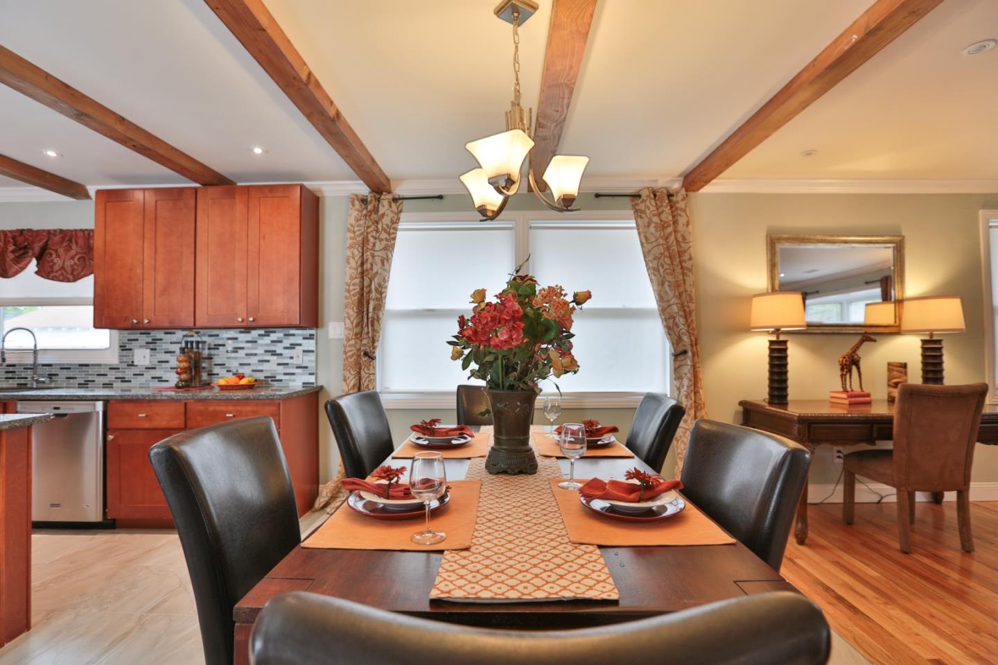 1663 Cross Way San Jose, CA 95125 - Photo 7 of 25 a view of a dining room with furniture a chandelier and wooden floor