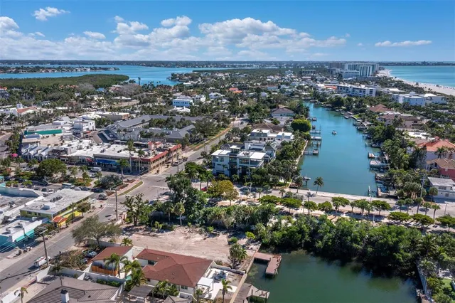 a view of a lake with a house in the background