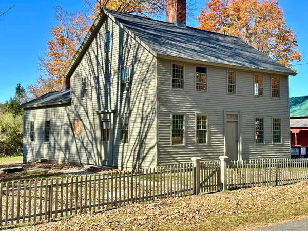 a view of a house with a porch