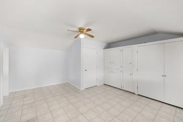 a view of a room with white walls