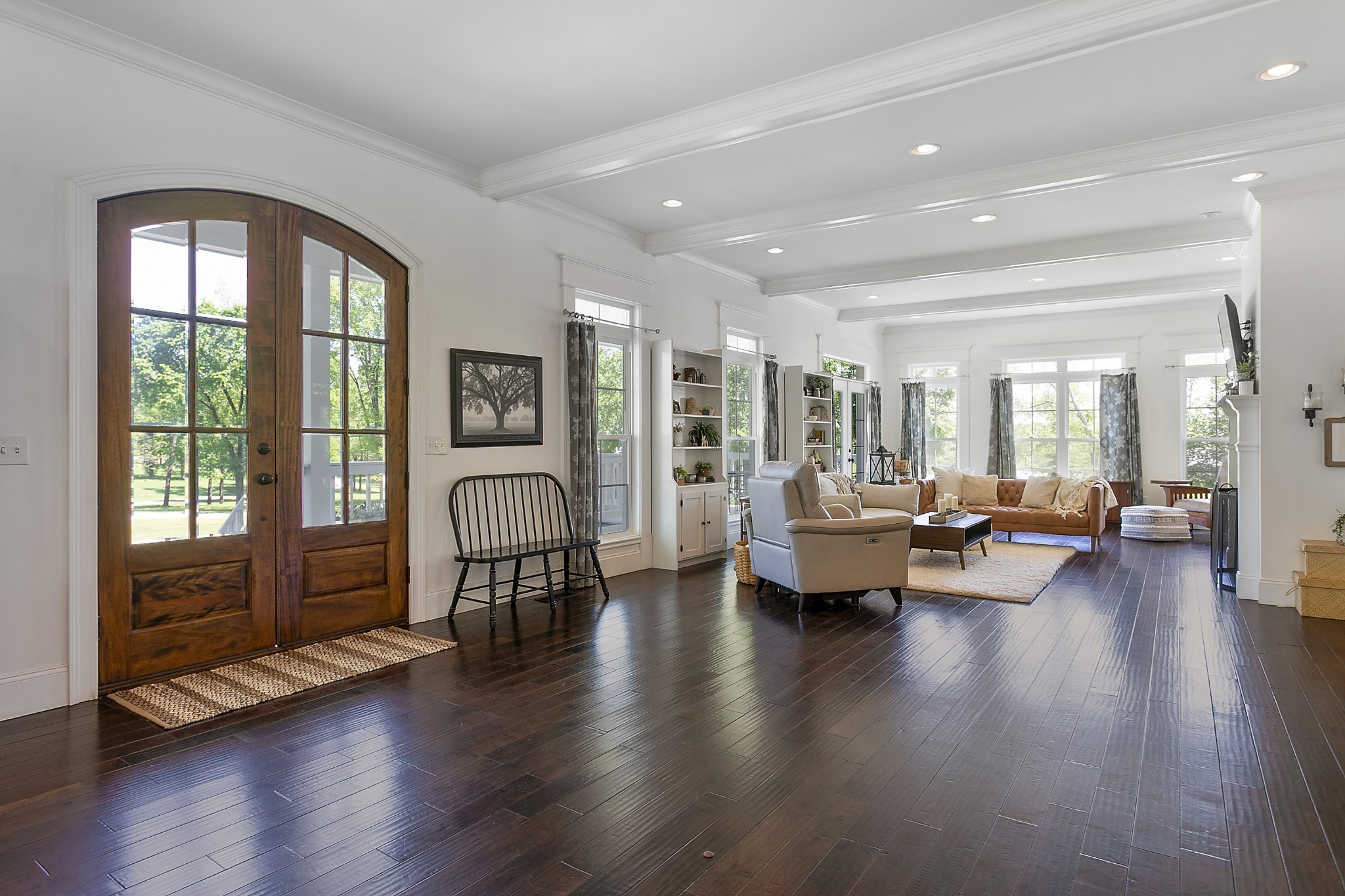 4280 Central Valley Road Murfreesboro, TN 37129 - Photo 13 of 50 Bright and natural light flows through this open space. Floor to ceiling windows feature upper glass transoms. Each window and French door has exquisite wood details on the headers and surrounding casements.