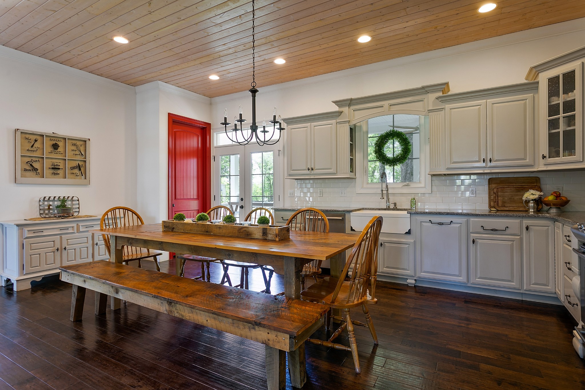 4280 Central Valley Road Murfreesboro, TN 37129 - Photo 16 of 50 This country kitchen is impressively spacious and embraces the farmhouse charm to its core. Enjoy coming together in this eat-in space with room for the largest dining table. The tall wood-planked ceilings add warmth to the heart of this home.