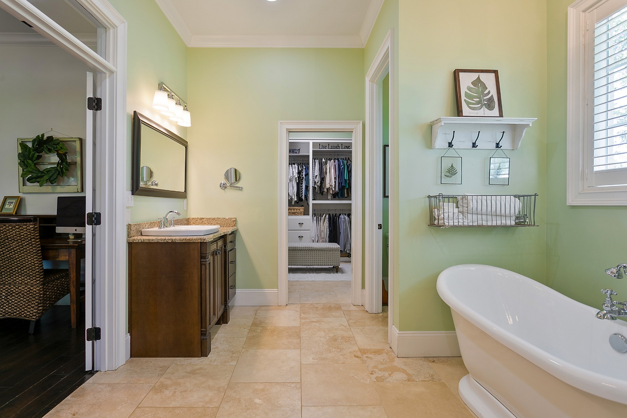 4280 Central Valley Road Murfreesboro, TN 37129 - Photo 27 of 50 Two separate vanities boast ample cabinetry storage and counter space. Walk through the bathroom to the spacious walk-in closet with custom built-ins. The bathroom windows feature wood shutters for privacy.