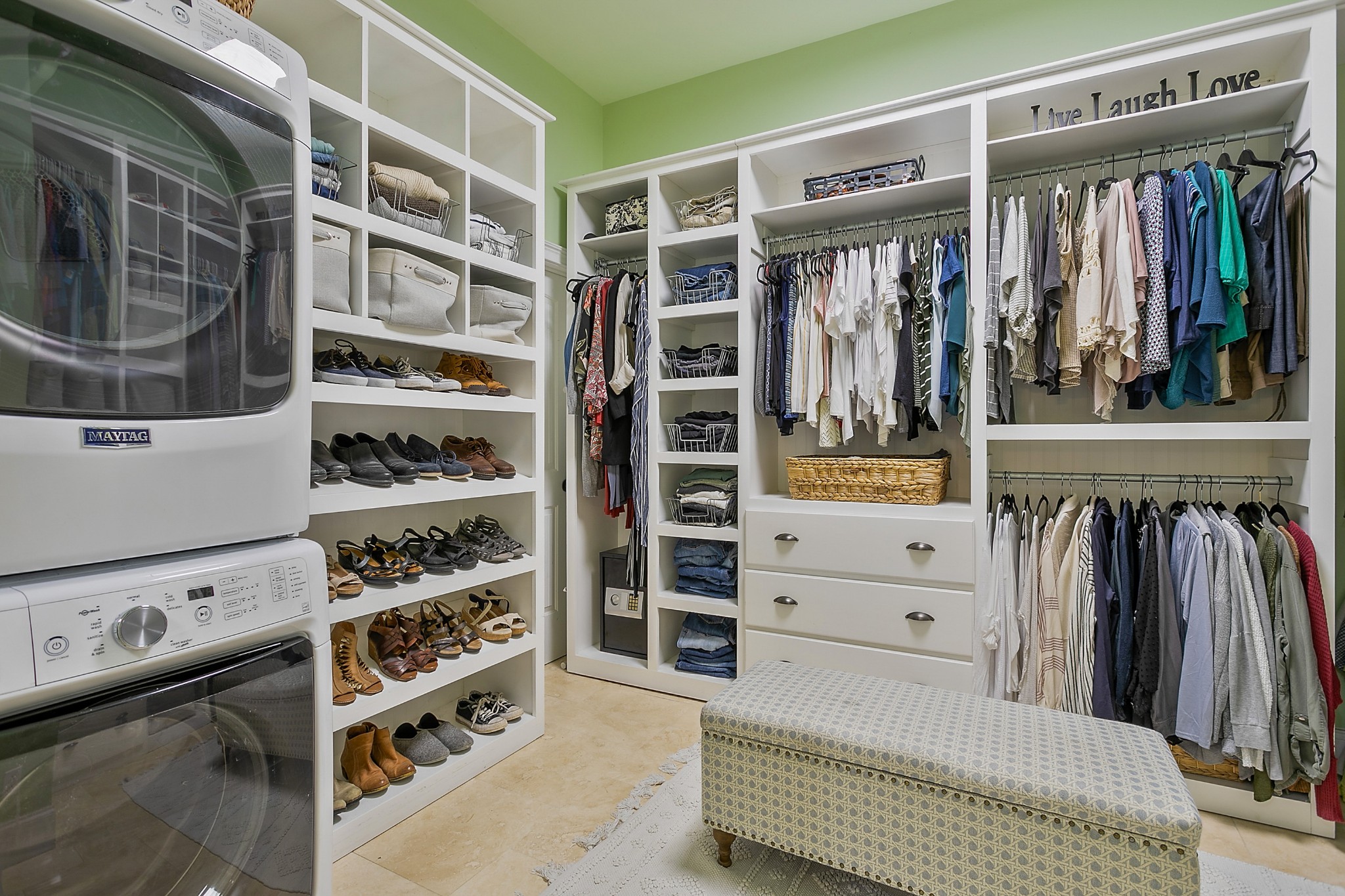 4280 Central Valley Road Murfreesboro, TN 37129 - Photo 28 of 50 This owner's closet features one of two laundry hookups. There is also a hidden access to the home's mechanical closet behind a moveable section of closet storage. The floors are tile.
