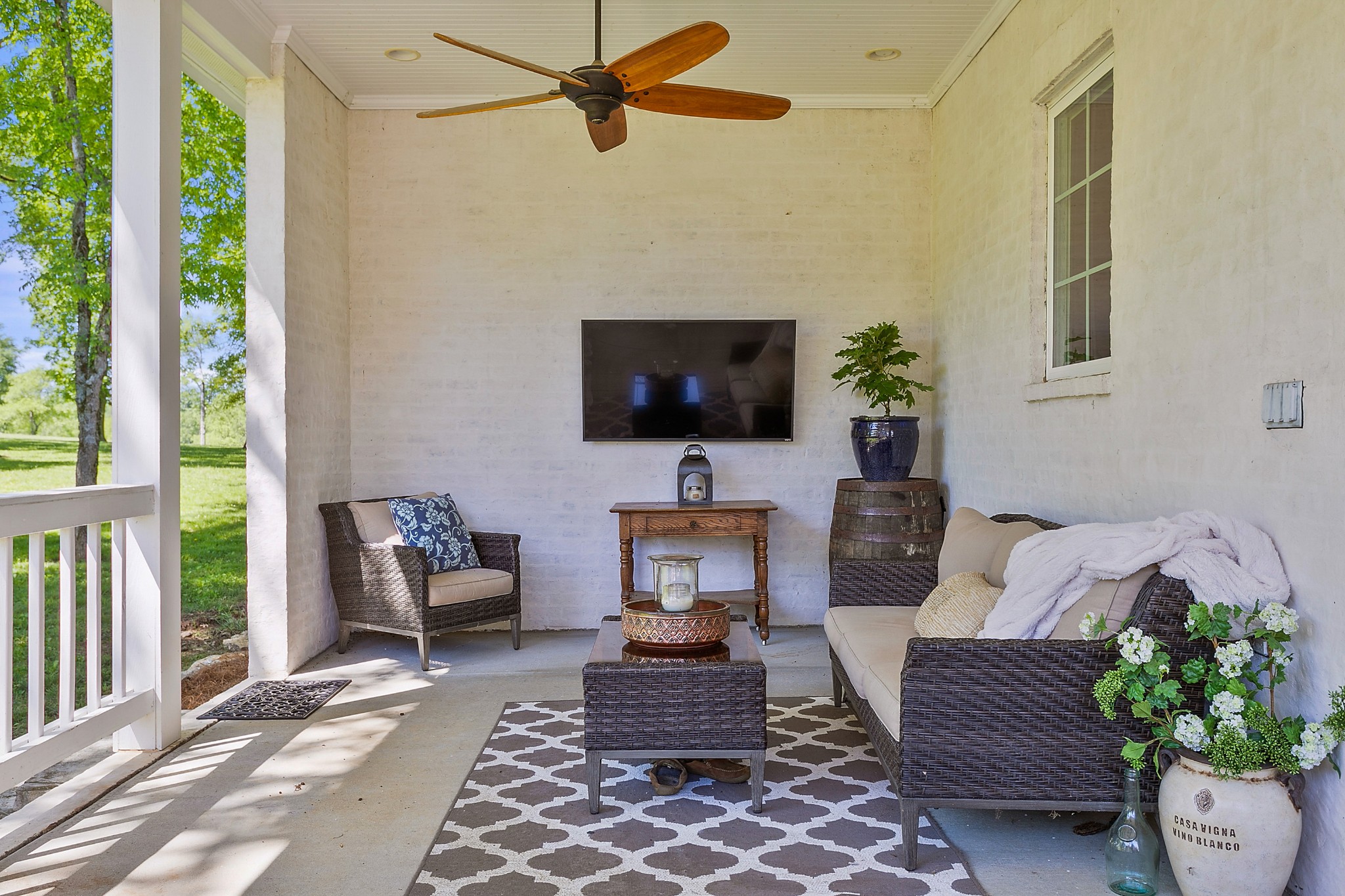 4280 Central Valley Road Murfreesboro, TN 37129 - Photo 39 of 50 Off the kitchen and through glass French doors is this second covered patio. Enjoy catching up with the daily news and a cup of coffee every morning in this space. There are 2 outdoor ceiling fans and recessed lights too.