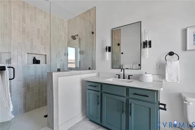 a bathroom with double sink and mirror