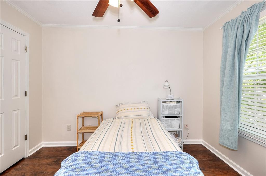 148 Alice Walker Drive Athens, GA 30607 - Photo 20 of 28 a bedroom with a bed and a window