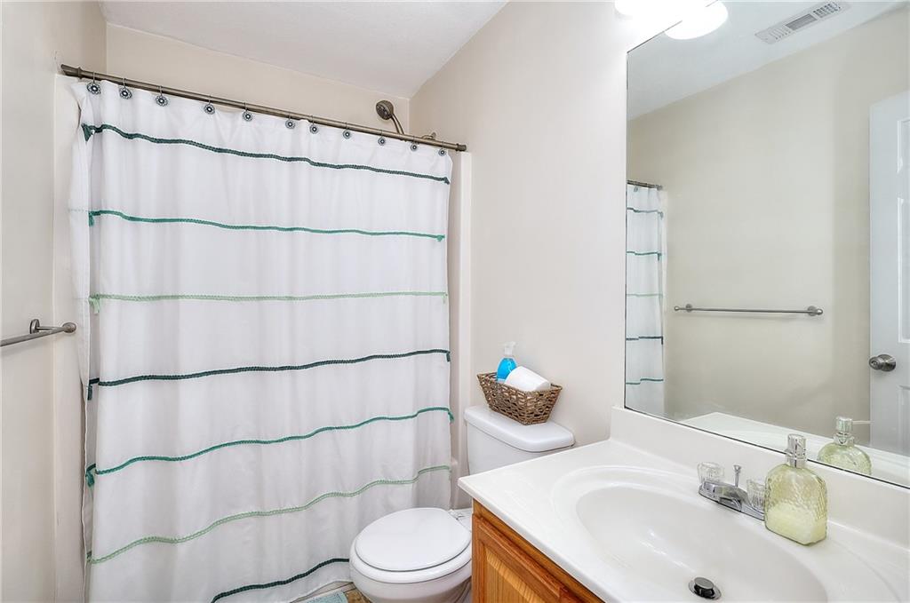 148 Alice Walker Drive Athens, GA 30607 - Photo 23 of 28 a bathroom with a sink toilet and shower
