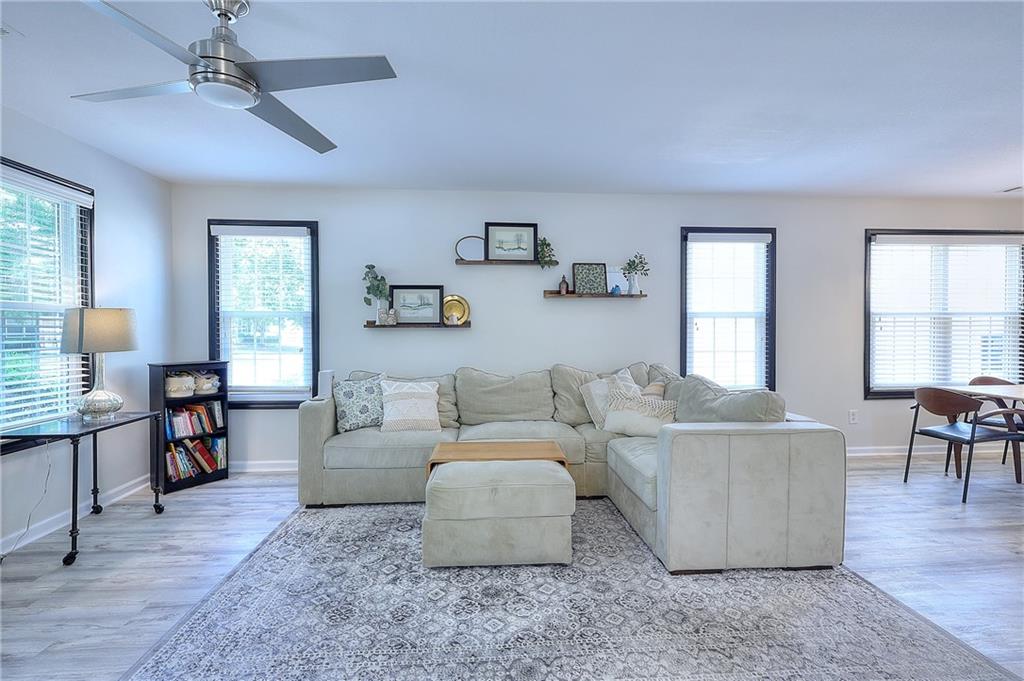 148 Alice Walker Drive Athens, GA 30607 - Photo 5 of 28 a living room with furniture and a table