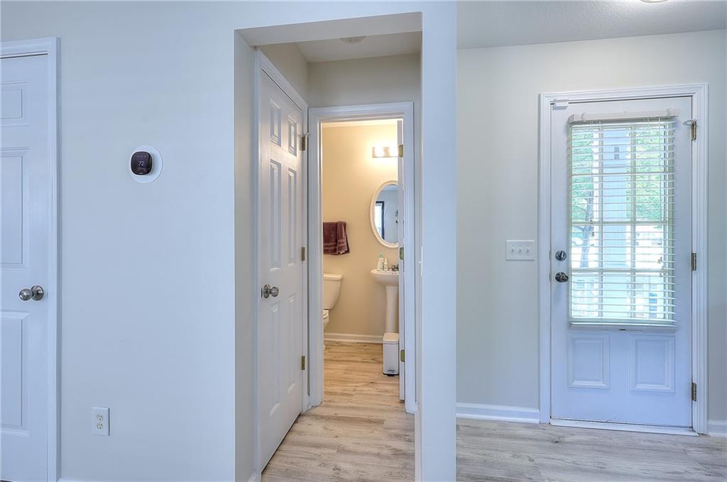 148 Alice Walker Drive Athens, GA 30607 - Photo 9 of 28 a view of a bathroom from a hallway