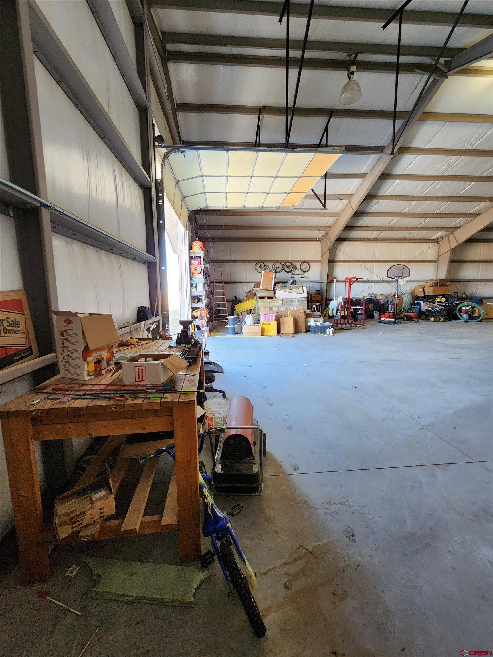 1935 Henderson Road Monte Vista, CO 81144 - Photo 12 of 23 a view of a room with gym equipment