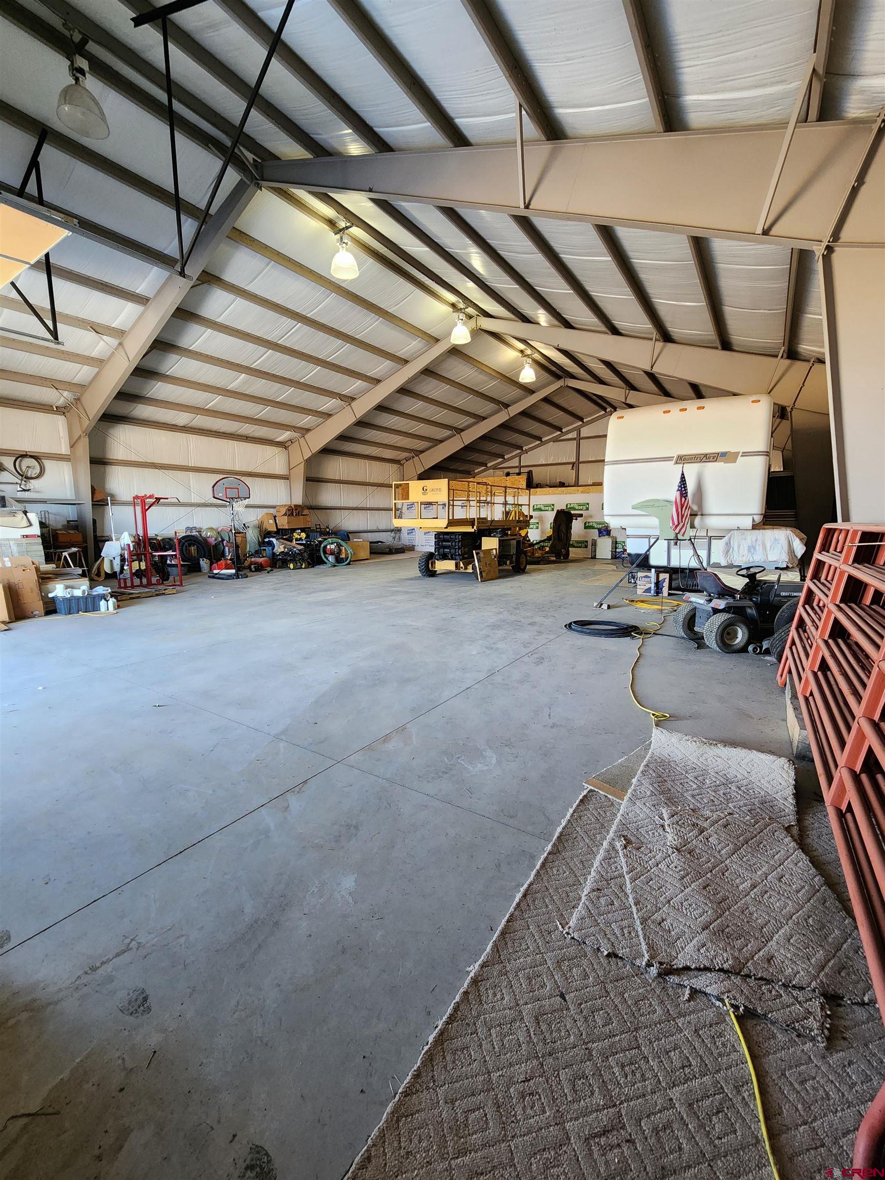 1935 Henderson Road Monte Vista, CO 81144 - Photo 13 of 23 a view of a garage with storage