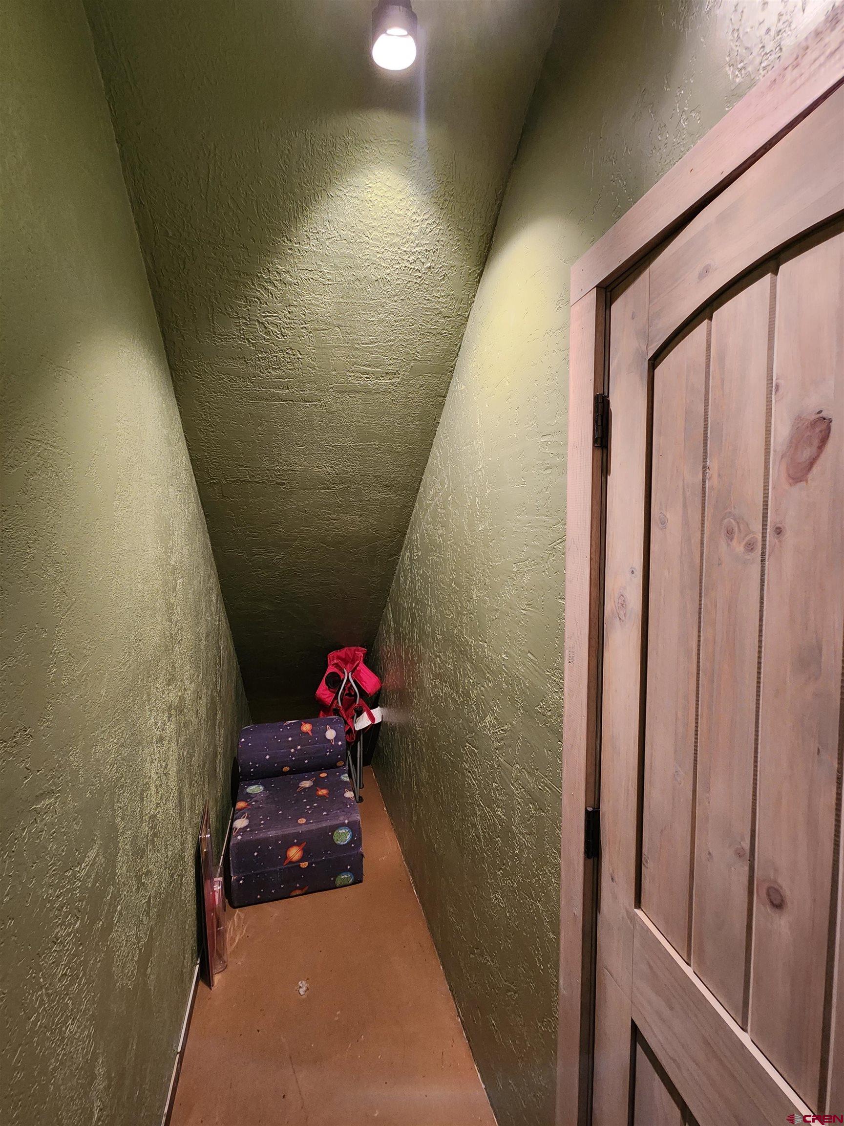 1935 Henderson Road Monte Vista, CO 81144 - Photo 14 of 23 a hallway with flowers and flowers