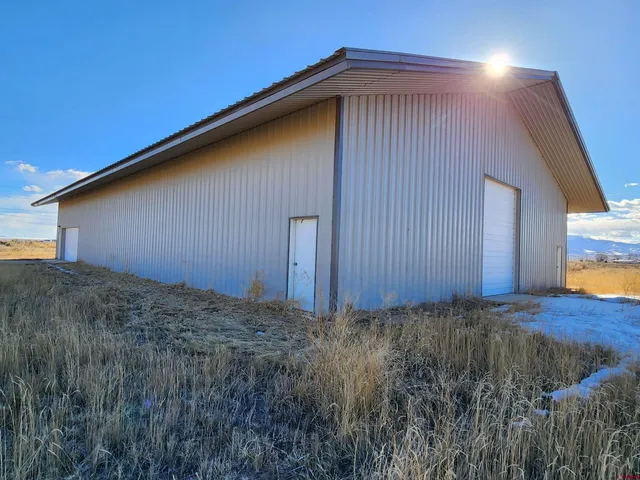 a view of patio with a yard