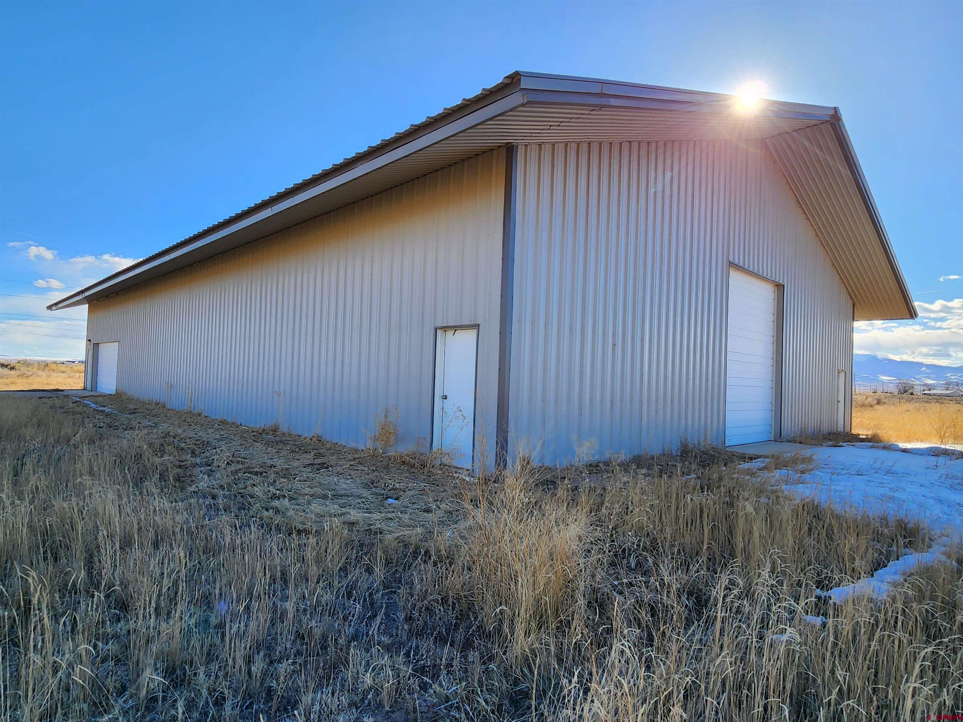 1935 Henderson Road Monte Vista, CO 81144 - Photo 3 of 23 a view of a backyard