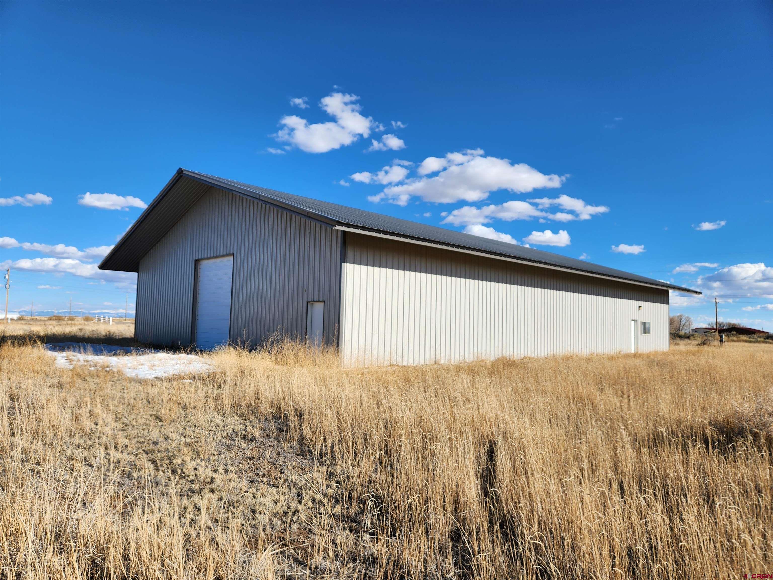 1935 Henderson Road Monte Vista, CO 81144 - Photo 4 of 23 a view of patio with a yard
