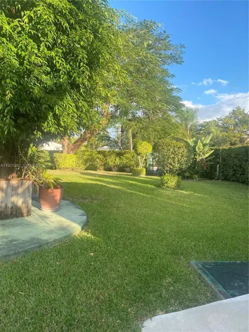 a view of a golf course with a lake