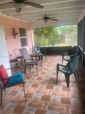 a outdoor space with lots of tables and chairs