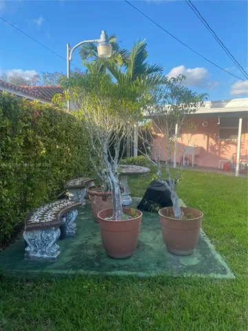 a view of a garden and patio