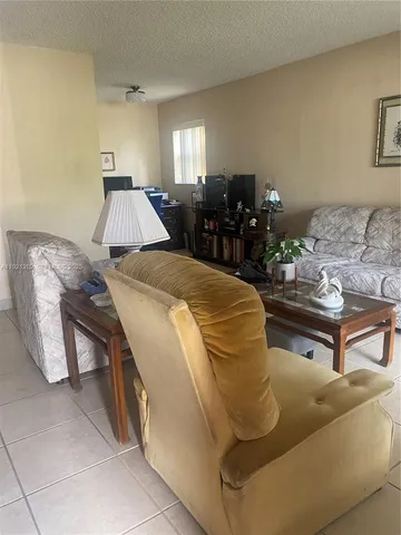 a bed room with a bed and furniture