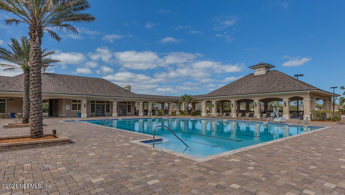 65776 Edgewater Drive Yulee, FL 32097 - Photo 20 of 45 a view of a house with a patio