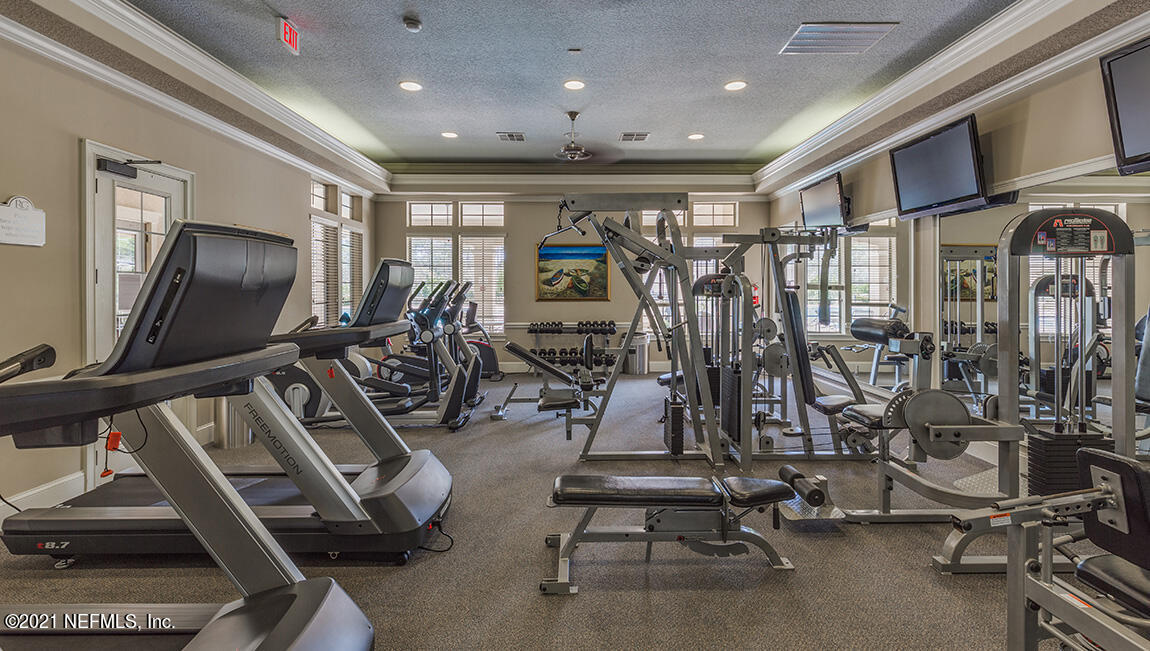 65776 Edgewater Drive Yulee, FL 32097 - Photo 24 of 45 a view of a room with gym equipment